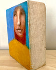 woman in ochre artblock