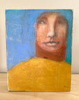 woman in ochre artblock