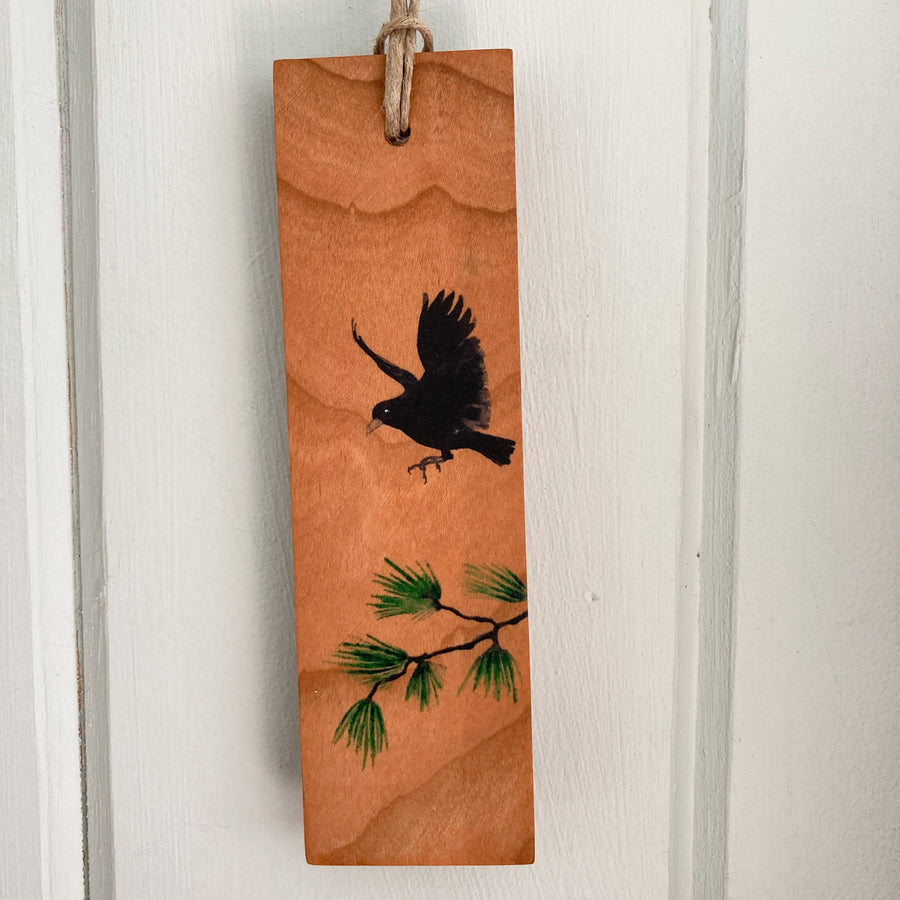 ornament: crow with pine