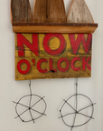 story keeper sculpture: now o'clock