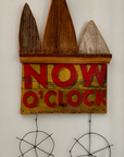 story keeper sculpture: now o'clock